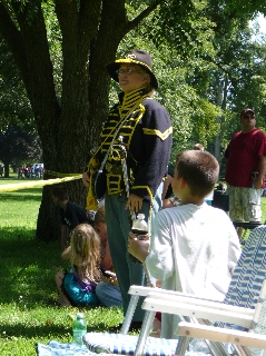 The Bugler waits to play To the Standard